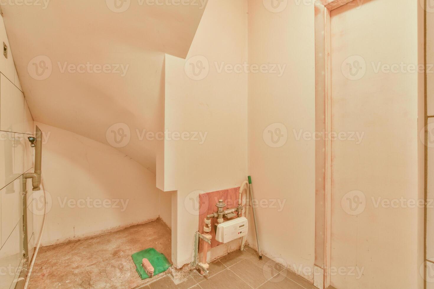 A bathroom with a toilet and a shower photo