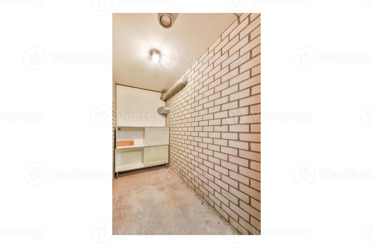 A bathroom with a brick wall and shelves photo