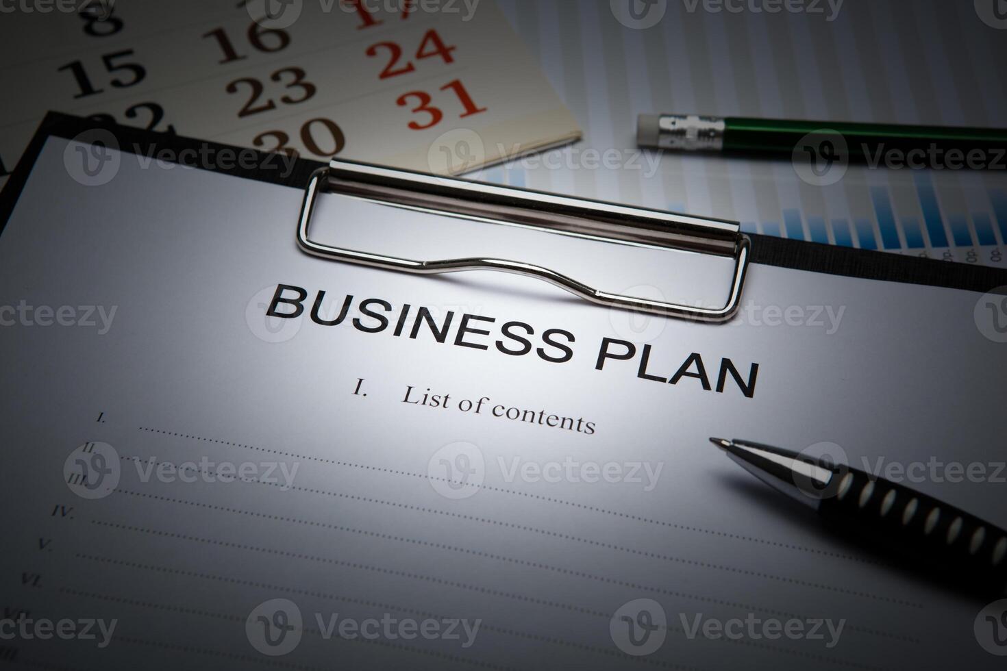 Business still life with business plan photo