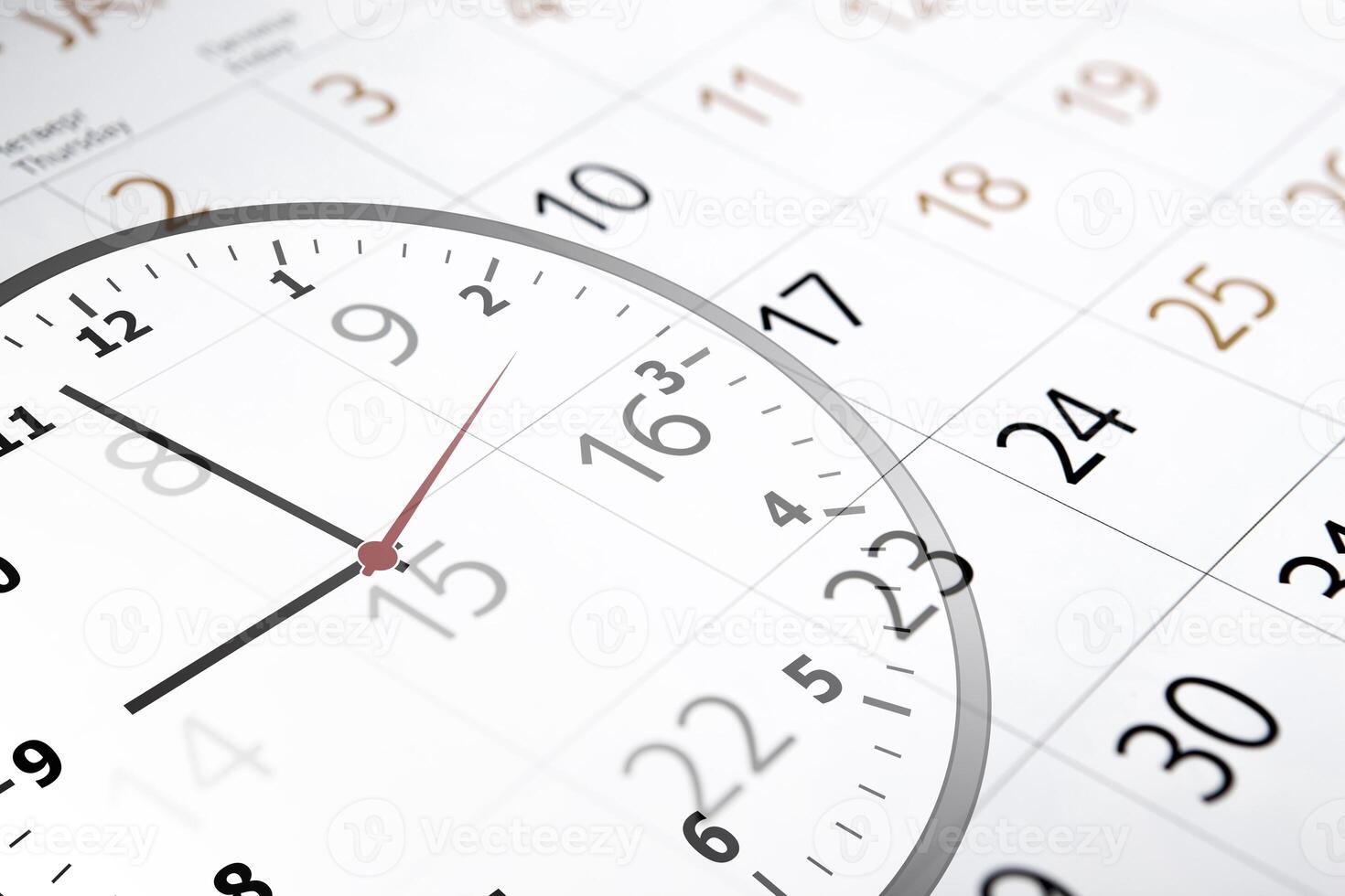 sheet of a calendar with the number of days and clock photo