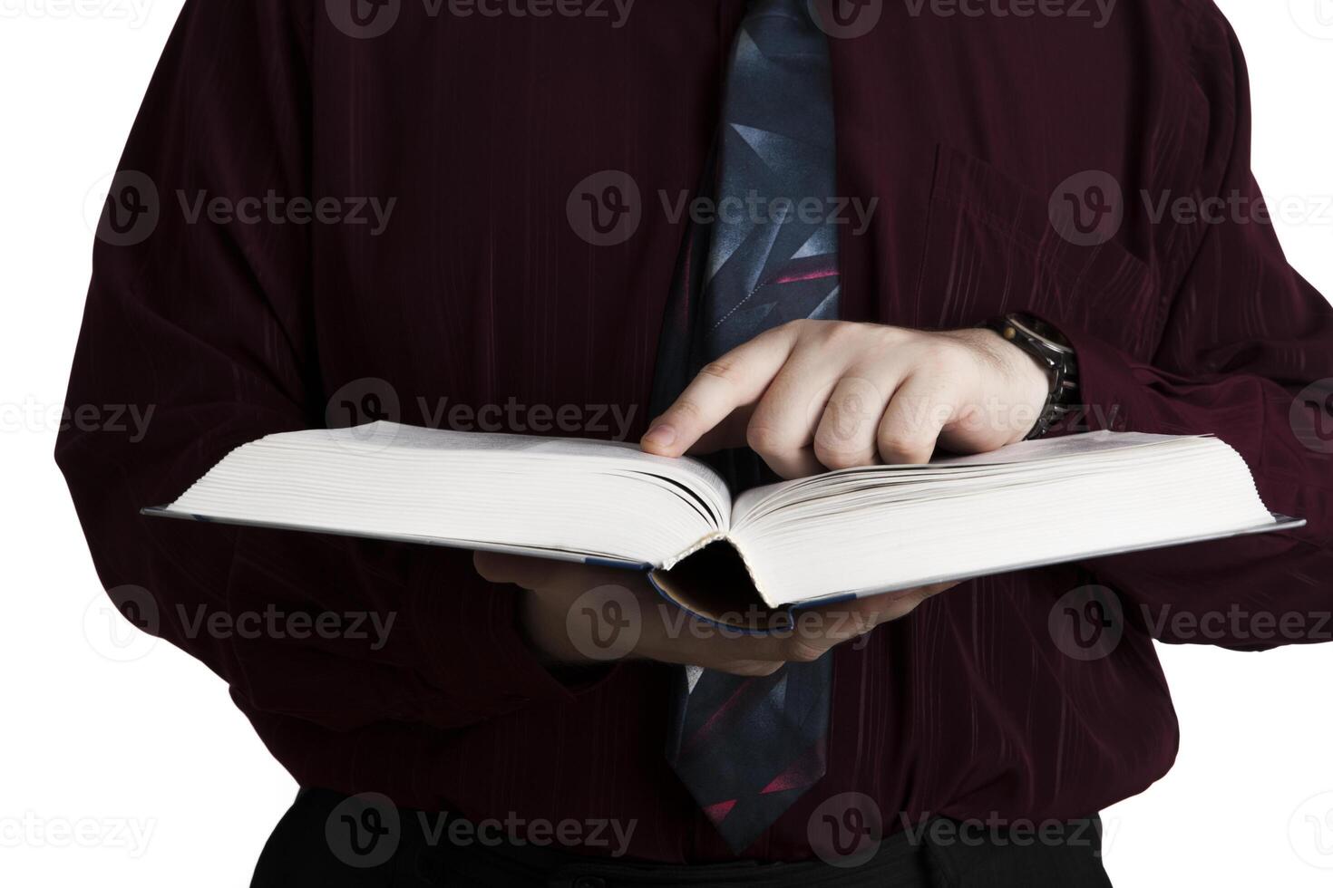 man holding an open book photo