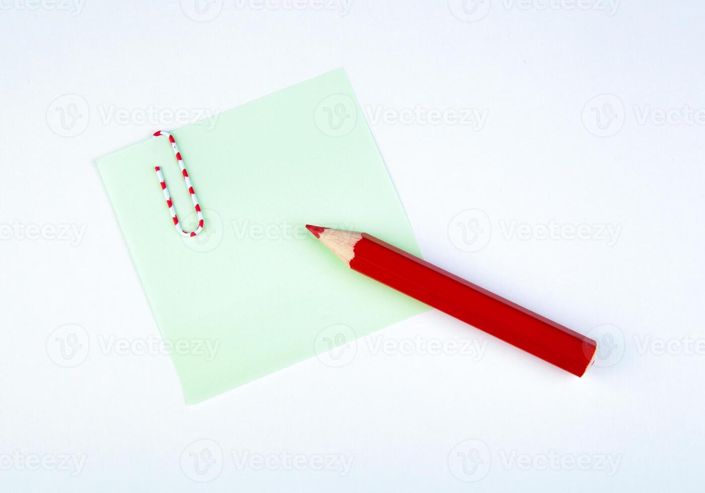 sheet of paper witn red pencil photo