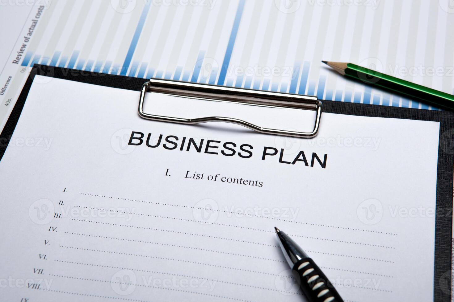 Business still life with business plan photo