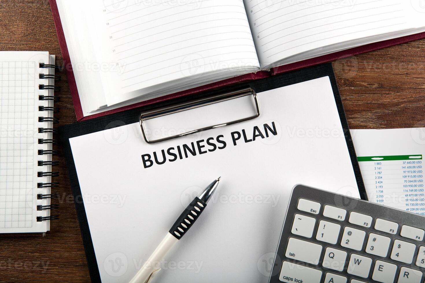 Business still life with business plan photo