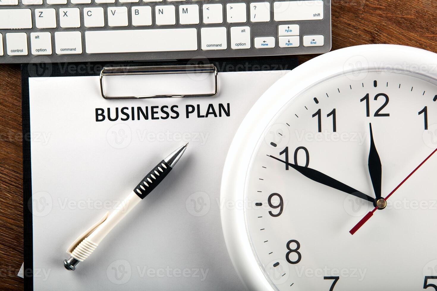 Business still life with business plan photo
