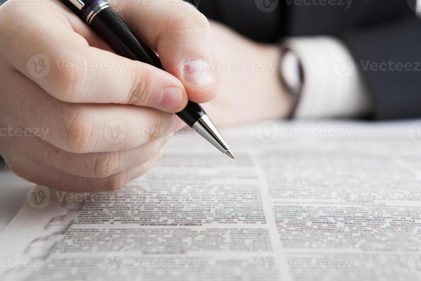 man is looking for information in the text photo