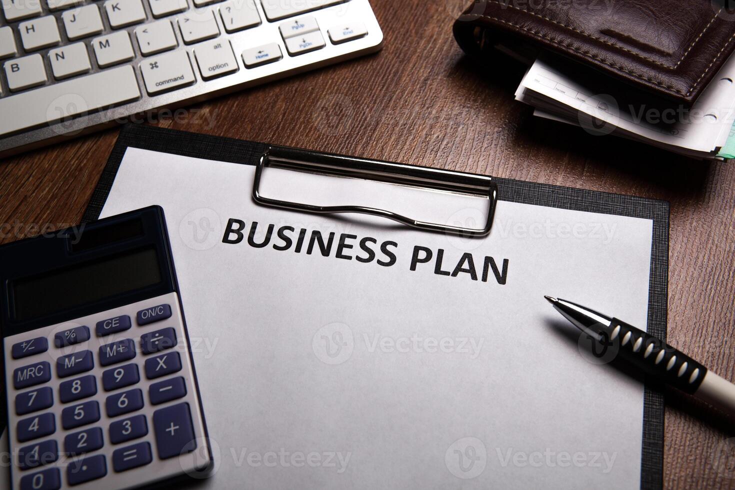 Business still life with business plan photo