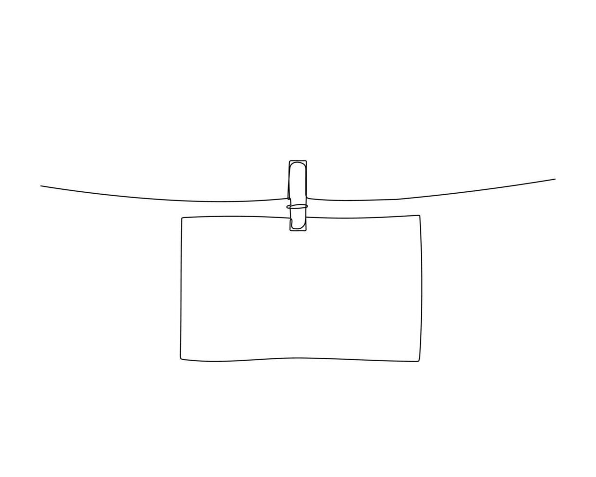 Paper hanging on the rope with clothespin, one continuous line drawing. Empty frame in outline doodle style vector