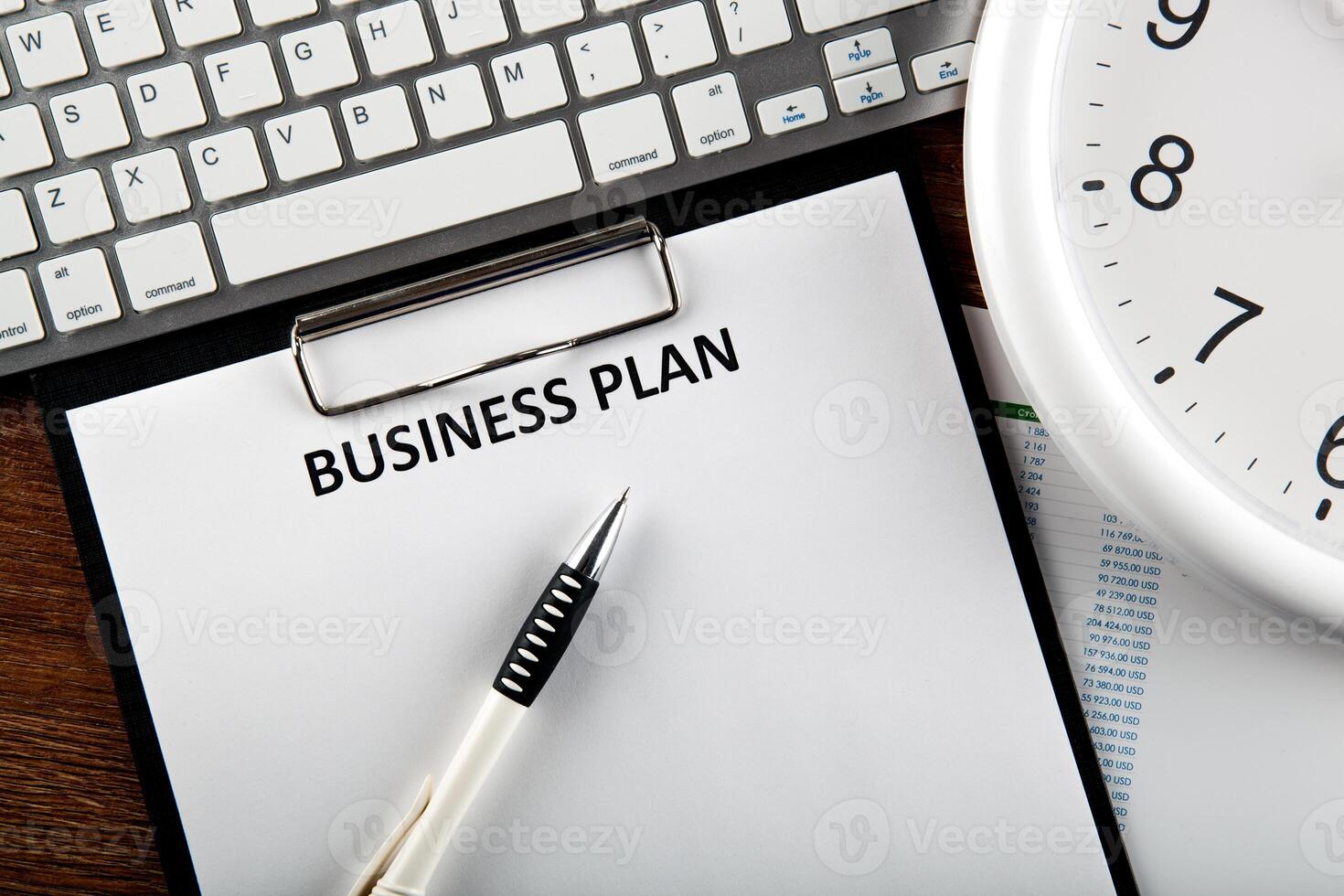 Business still life with business plan photo