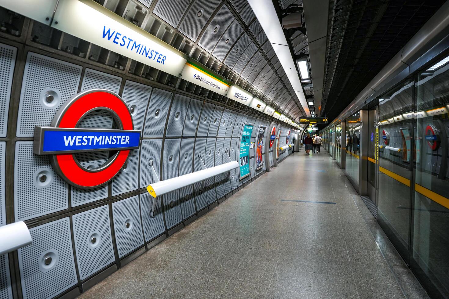 LONDON, UK - SEP 01, 2024- Westminster underground station and platform station with westminster sign. photo