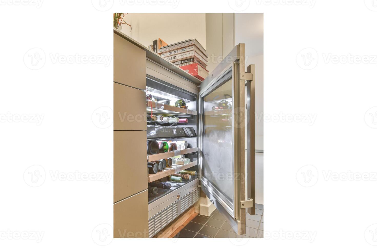 A refrigerator with a door open to show its contents photo