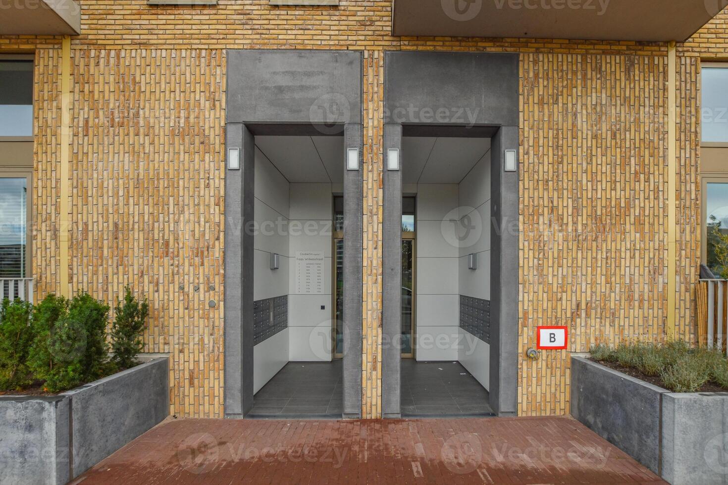 A building with two doors on the side of it photo