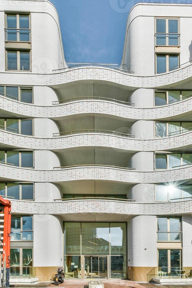 A building with a large white facade photo