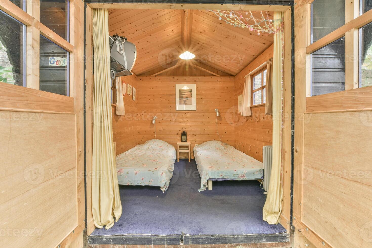 A bedroom with two beds in it photo