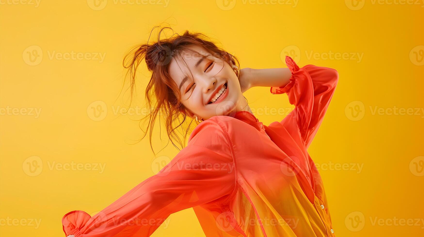 Vibrant Hallyu Woman Dancing in Stylish Costume Against Yellow Background photo