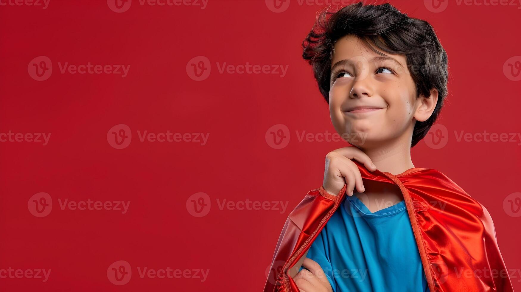A young boy in a superhero costume photo