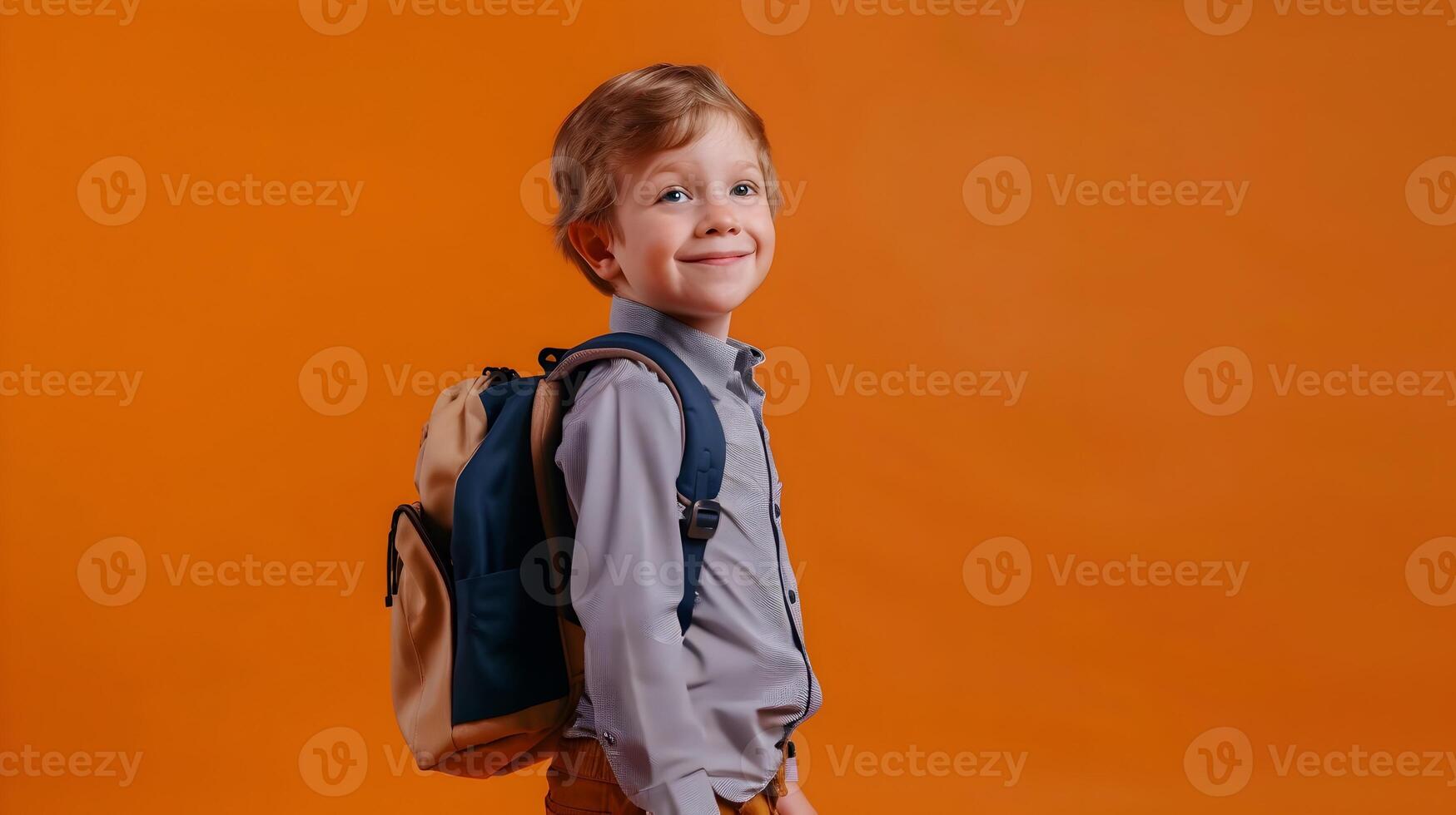 Cheerful Young Student Excited to Return to School Wearing Preppy Outfit photo