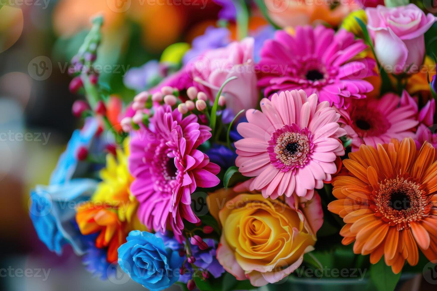 A vase filled with colorful flowers photo