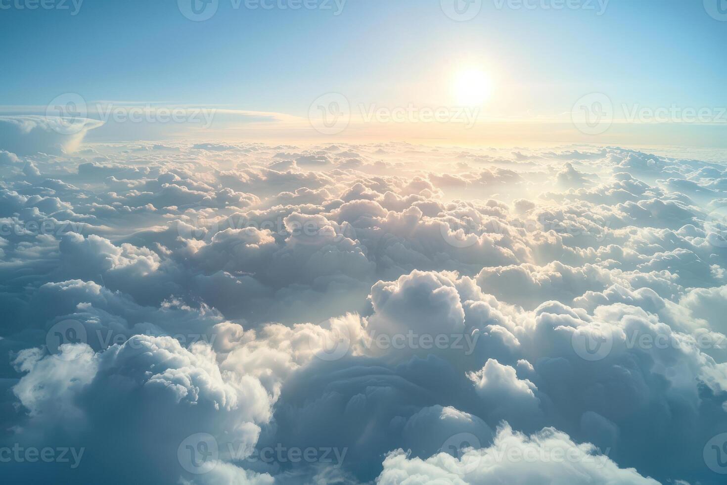 The sun is shining through the clouds in this photo