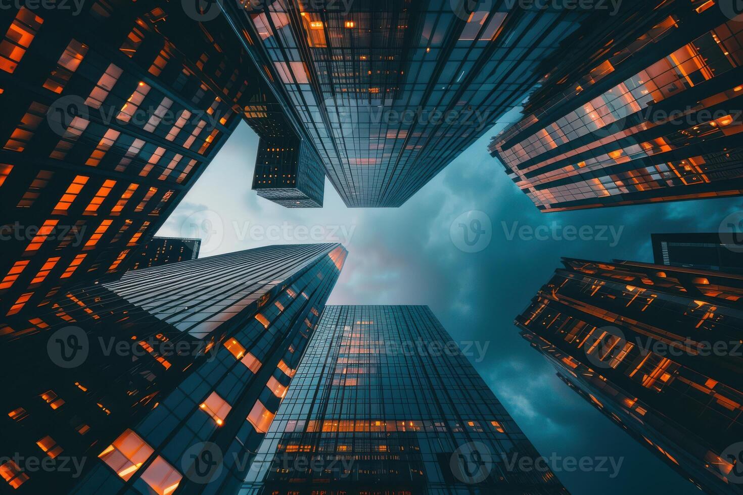 Tall buildings with windows and lights in the sky photo