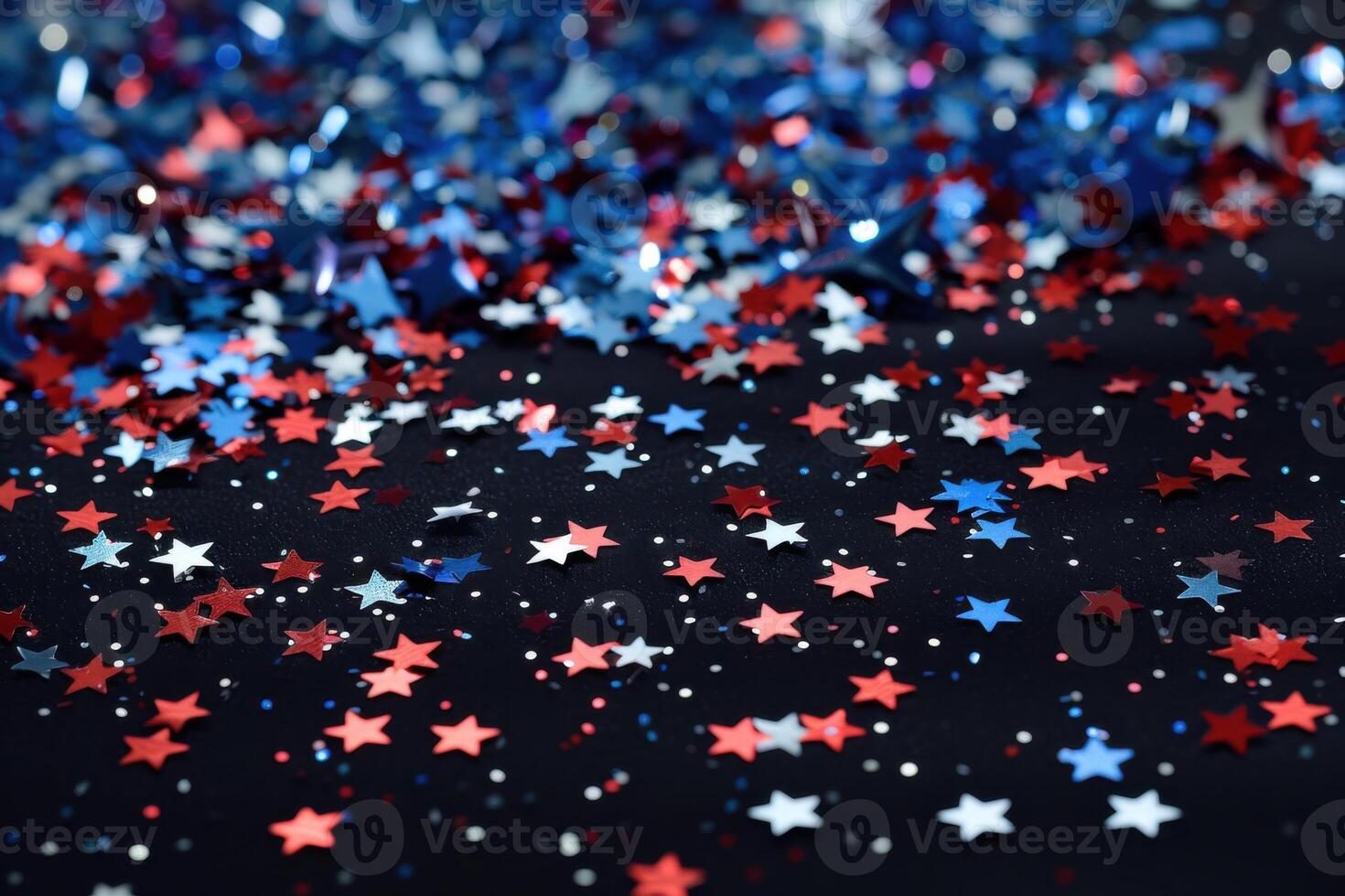 Red, white and blue stars on a black background photo