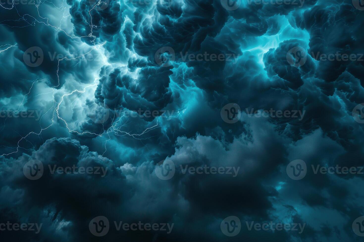 A dark blue sky with clouds and lightning photo