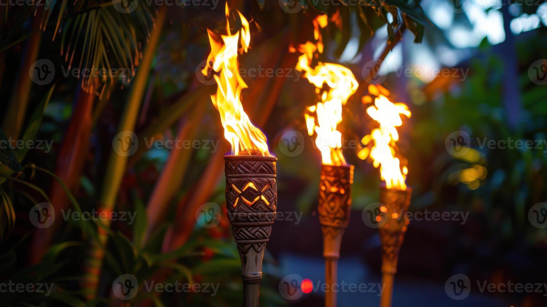 Three torches are lit up with flames photo