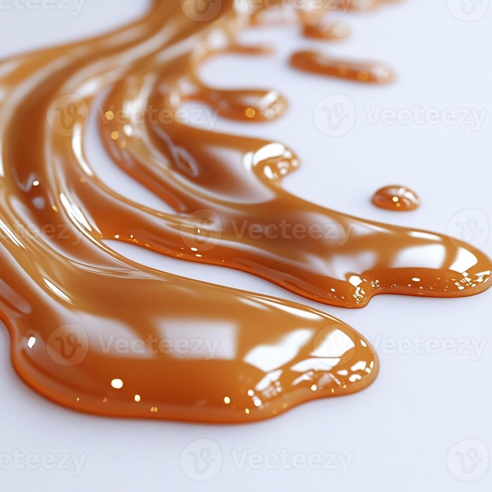 Drizzle of caramel sauce creating an abstract pattern on a pristine white background smooth and glossy photo