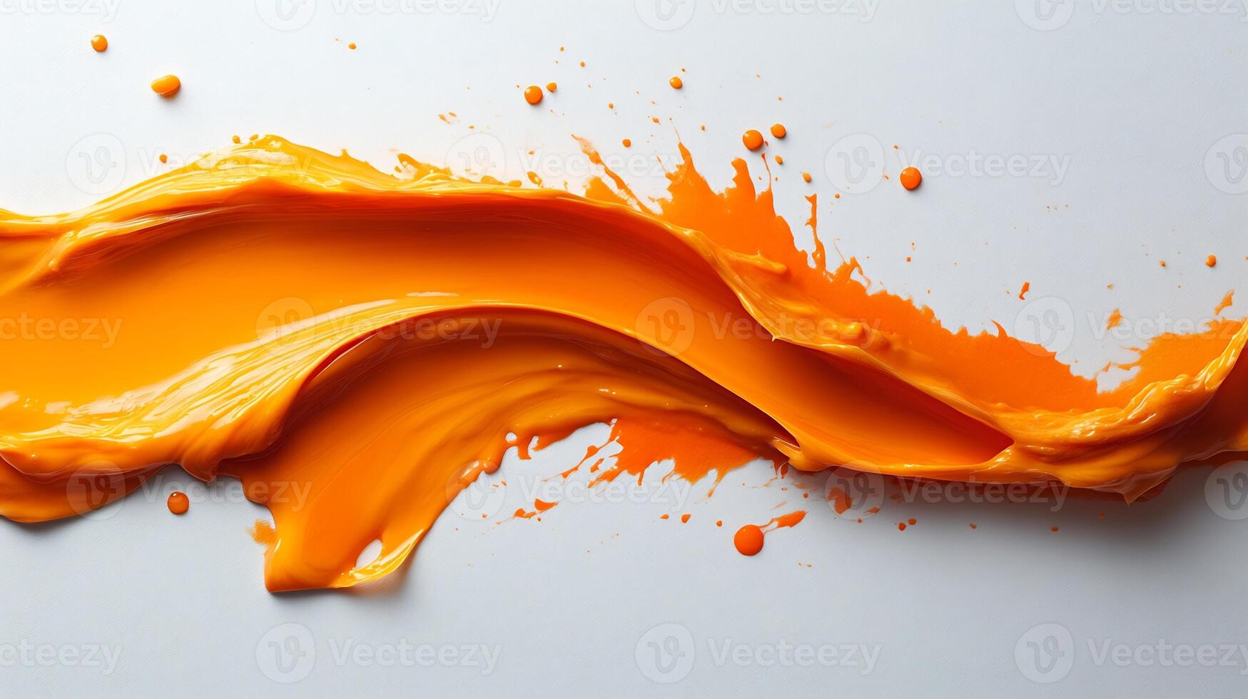 Splash of fiery habanero sauce spread across a white background showcasing its vibrant orange hue photo