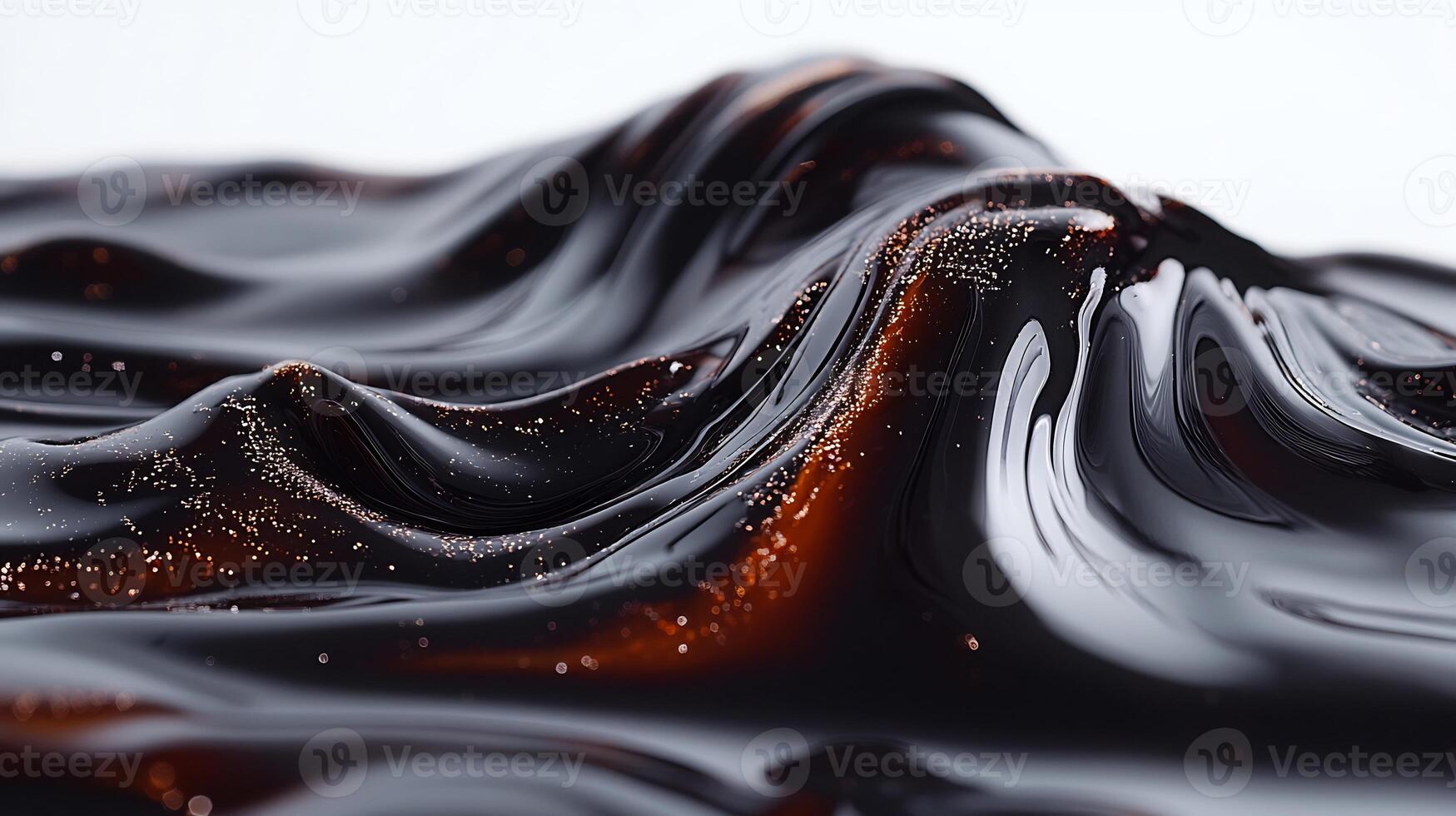 Swirl of dark balsamic vinegar on a white background creating a rich and tangy artistic design photo