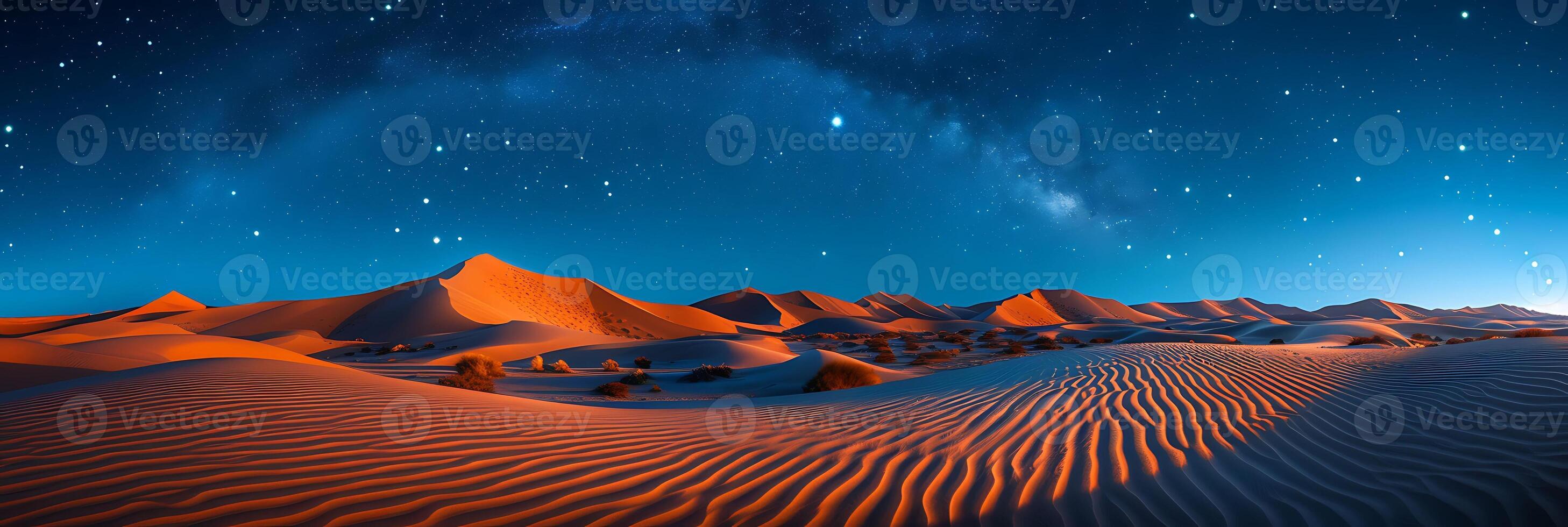 Surreal long exposure photo of a desert landscape at night with stars streaking across the sky and sand dunes illuminated by moonlight