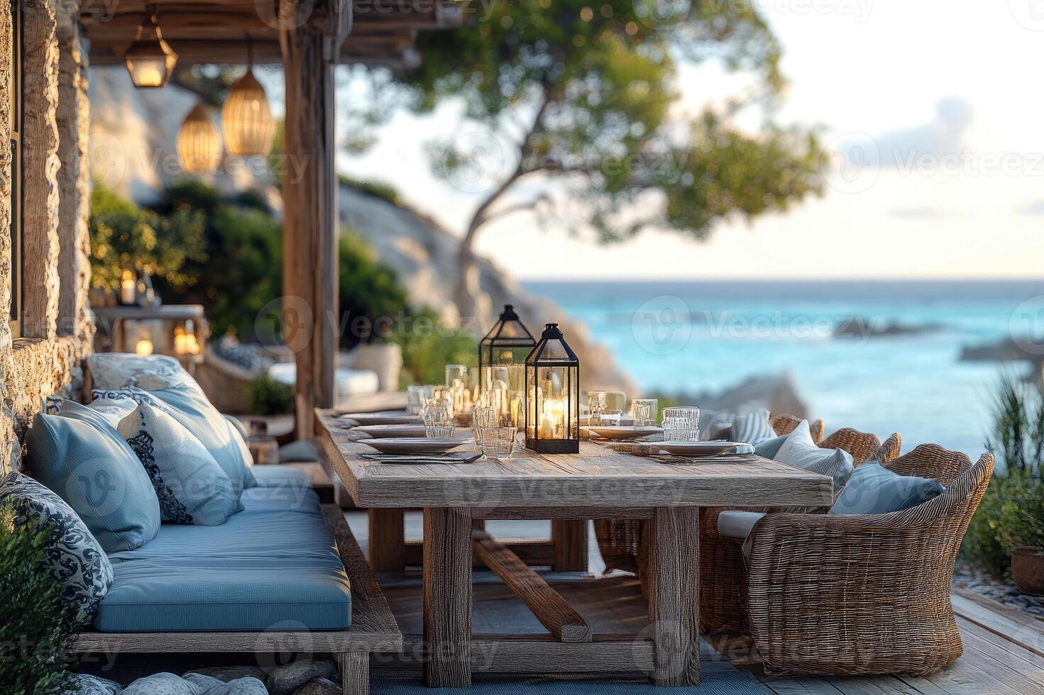 Rustic outdoor dining setup with ocean view photo