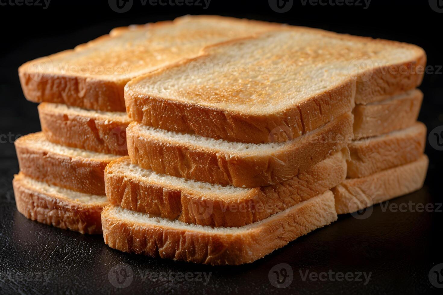 Stack of Freshly Toasted Sliced Bread on Black Background - Breakfast, Food, Nutrition, Culinary Delight photo