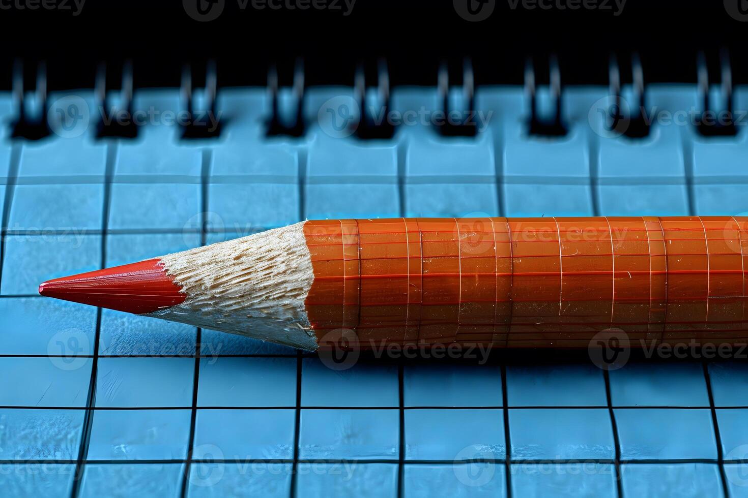Red Pencil on Blue Graph Paper - Educational and Artistic Back to School Design photo