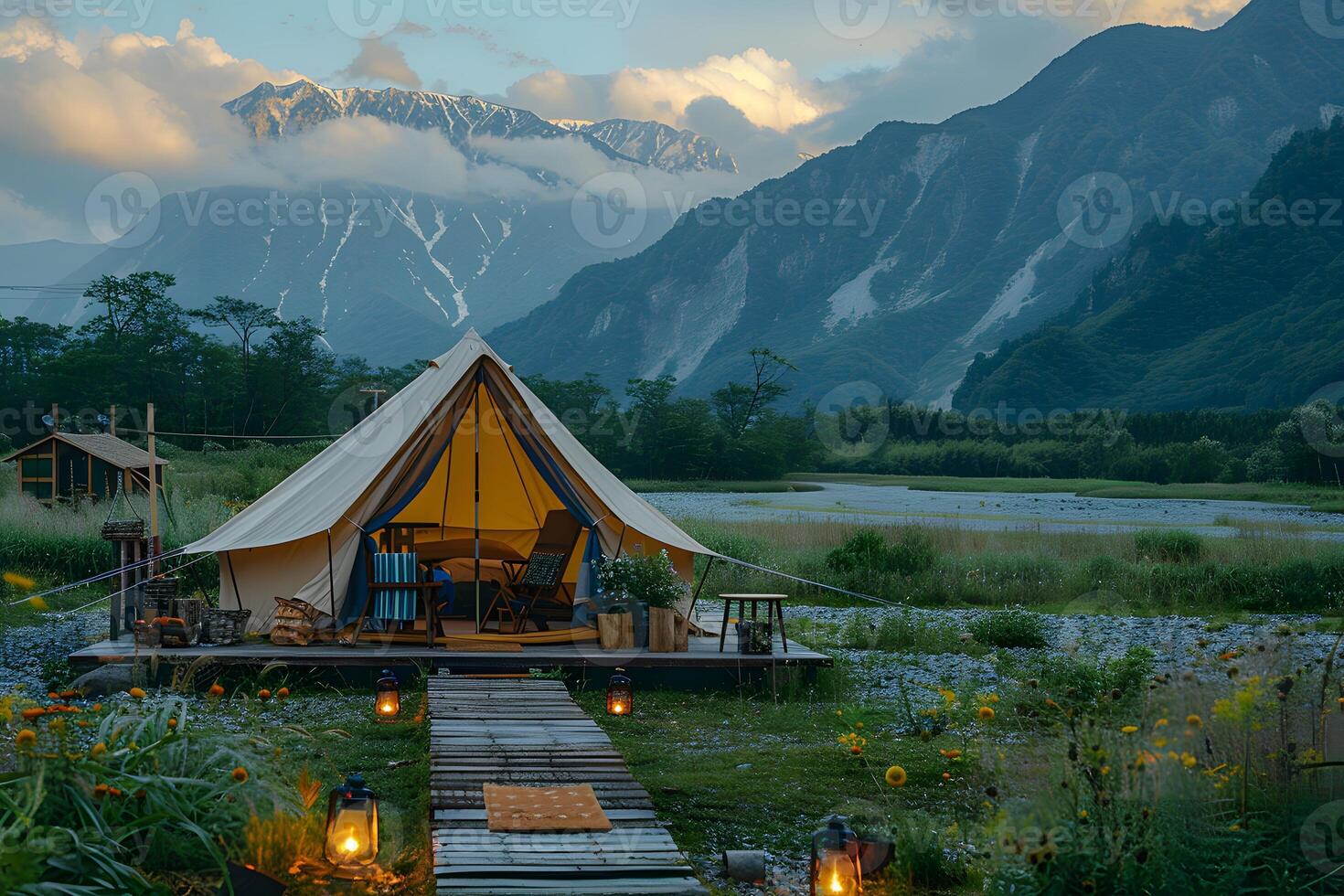 Stunning Mountain Glamping Setup with Luxurious Tent and Scenic Alpine Backdrop for Nature Retreats photo