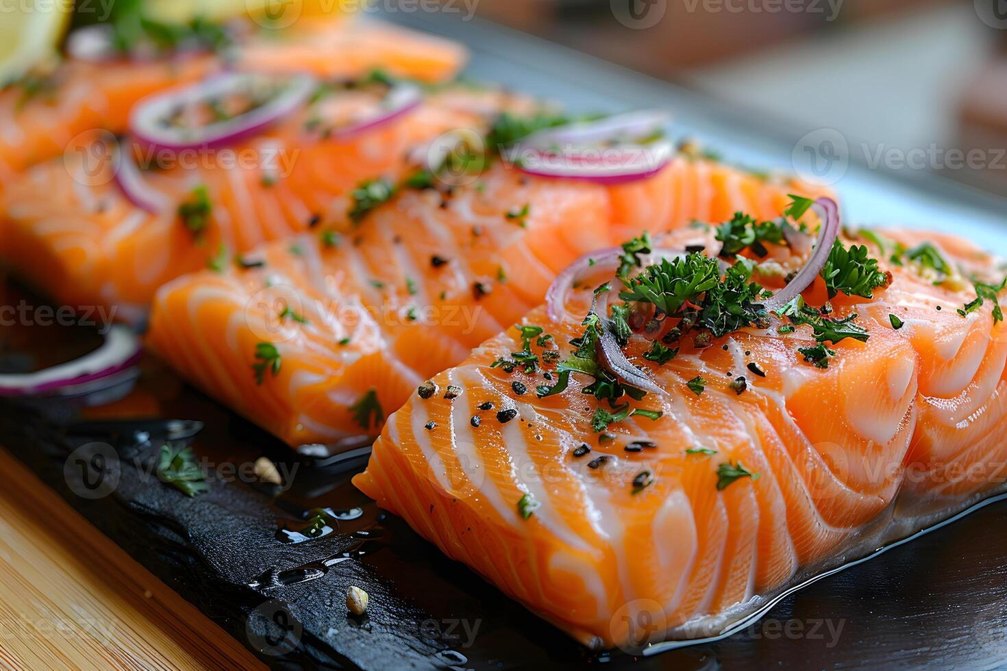 Freshly Sliced Raw Salmon with Herbs and Red Onions - Perfect for Sushi Preparation and Gourmet Dishes photo