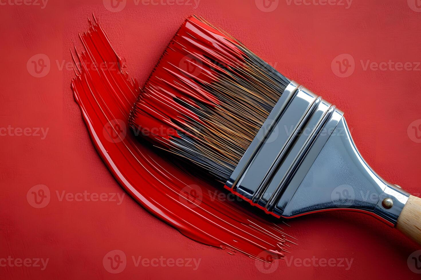 Close-Up of Paintbrush with Red Paint Stroke on Canvas for Home Decor and Art Projects photo