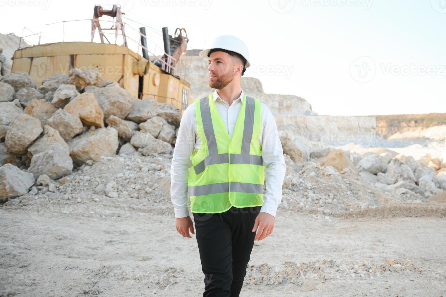 Quarry worker doing a quality check photo