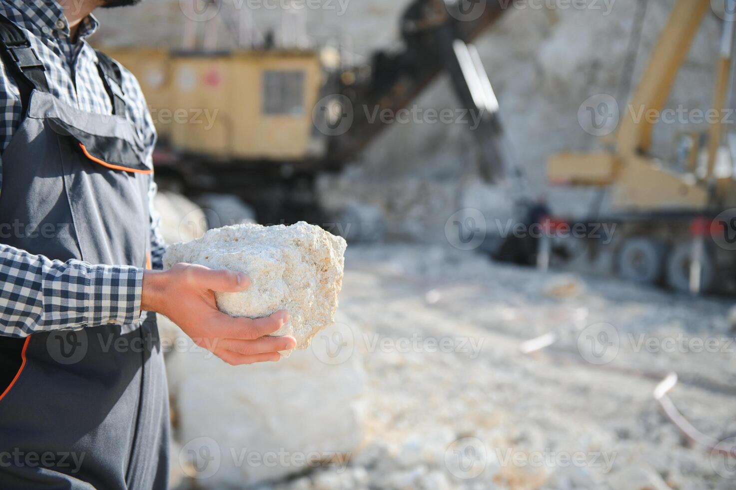Quarry worker doing a quality check photo