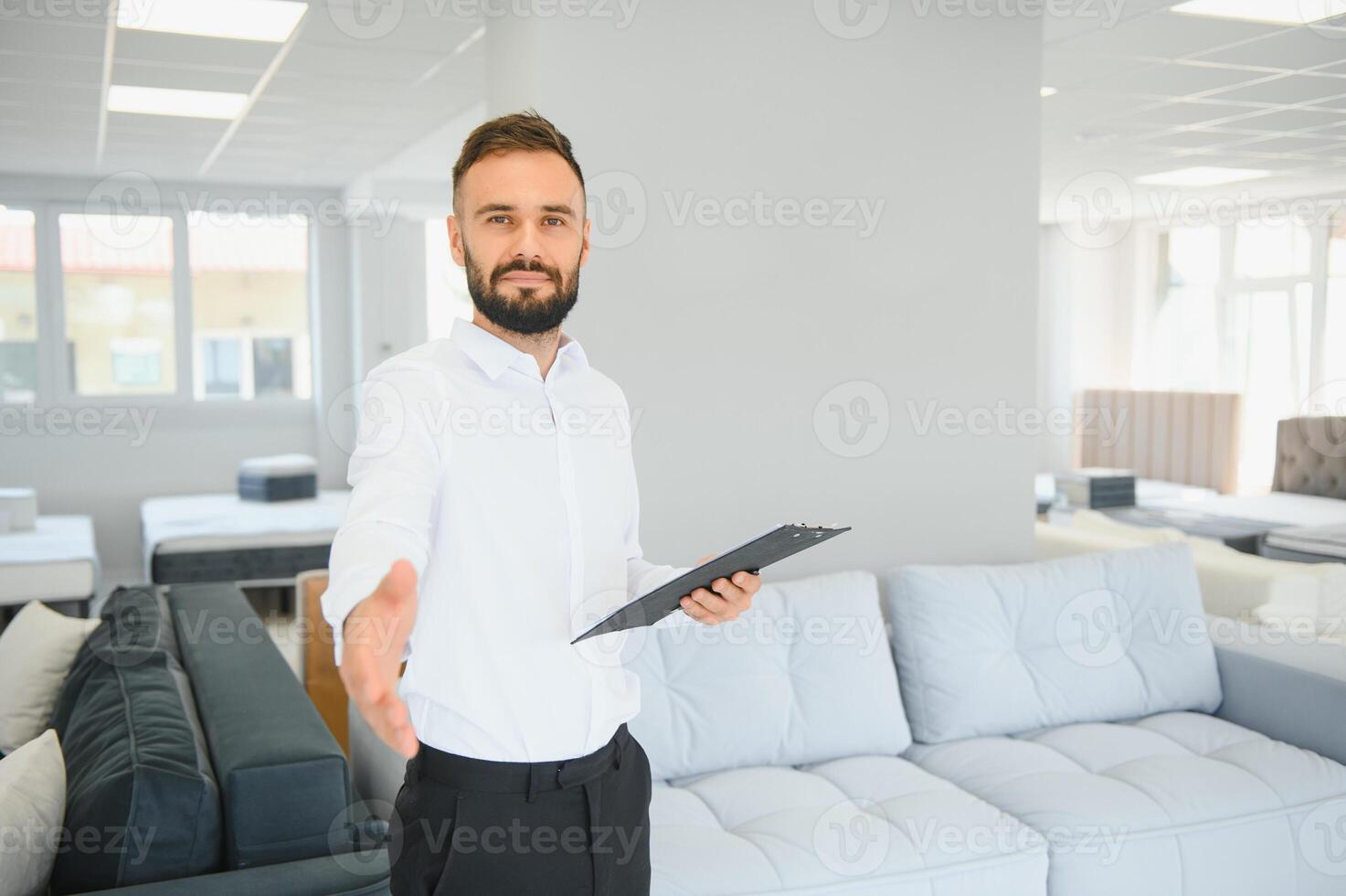 Sales assistant in furniture store photo