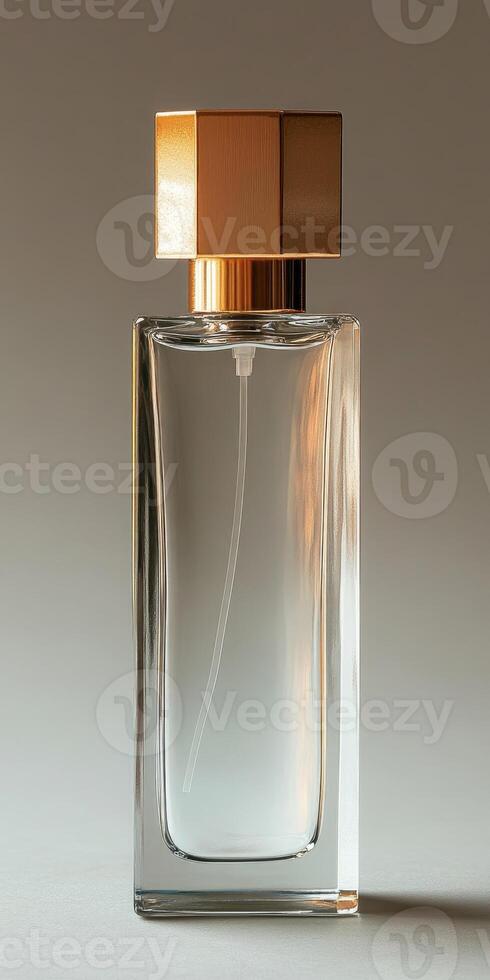 Transparent perfume bottle casting a shadow on a tabletop photo