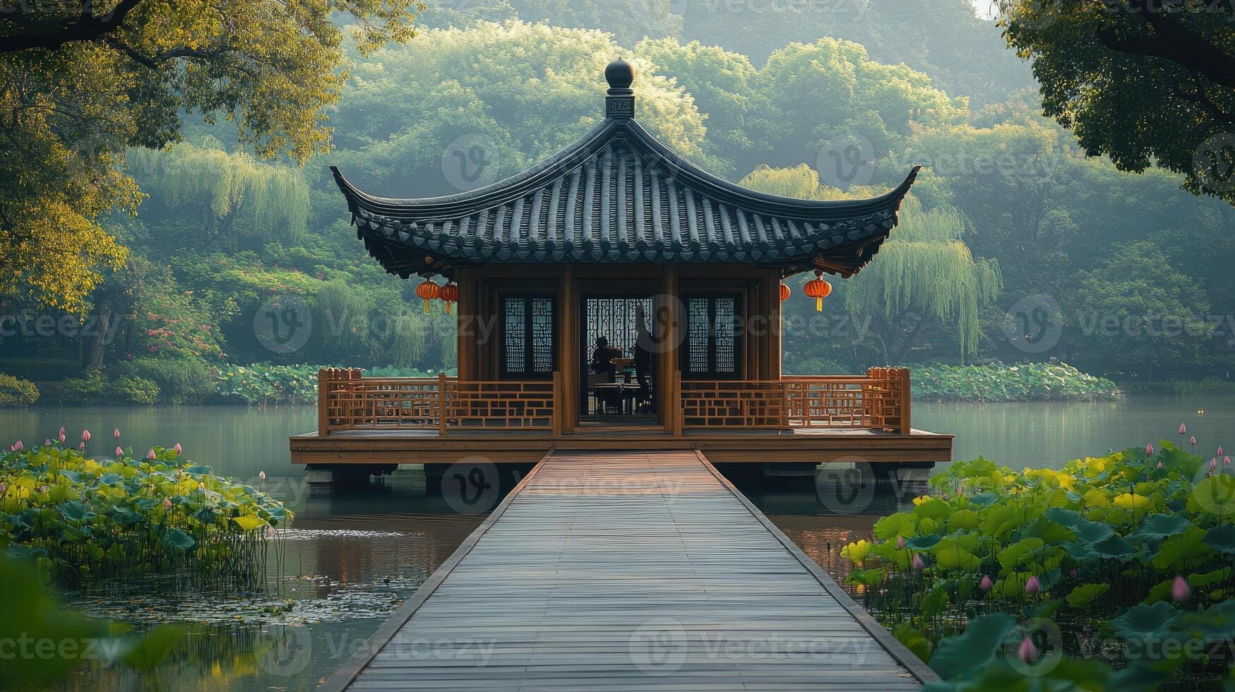 Wooden pathway leading to a pavilion on a lake in a public park with lush vegetation photo