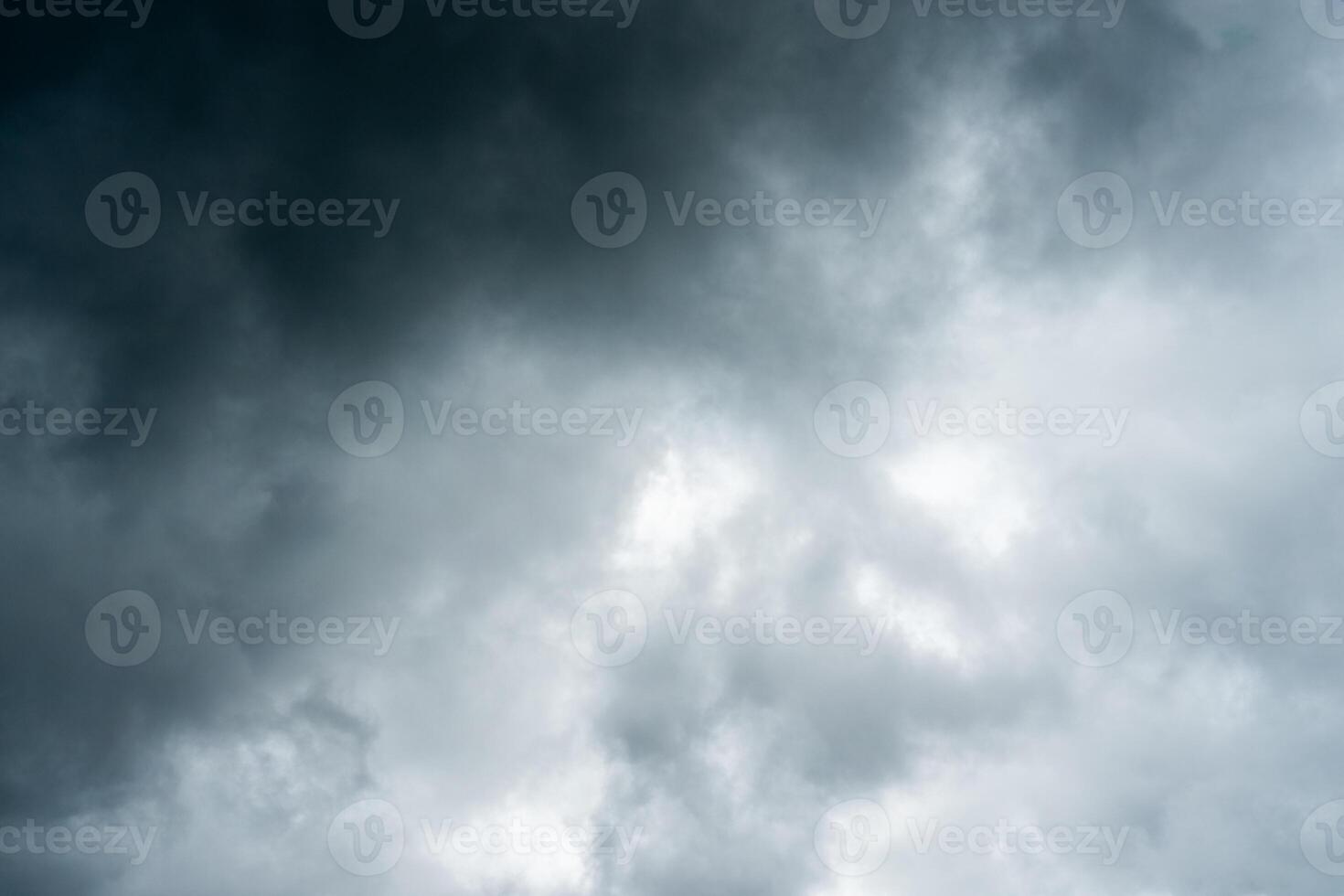Dark dramatic storm cumulus clouds in autumn. An impending storm, hurricane or thunderstorm. Bad weather. photo
