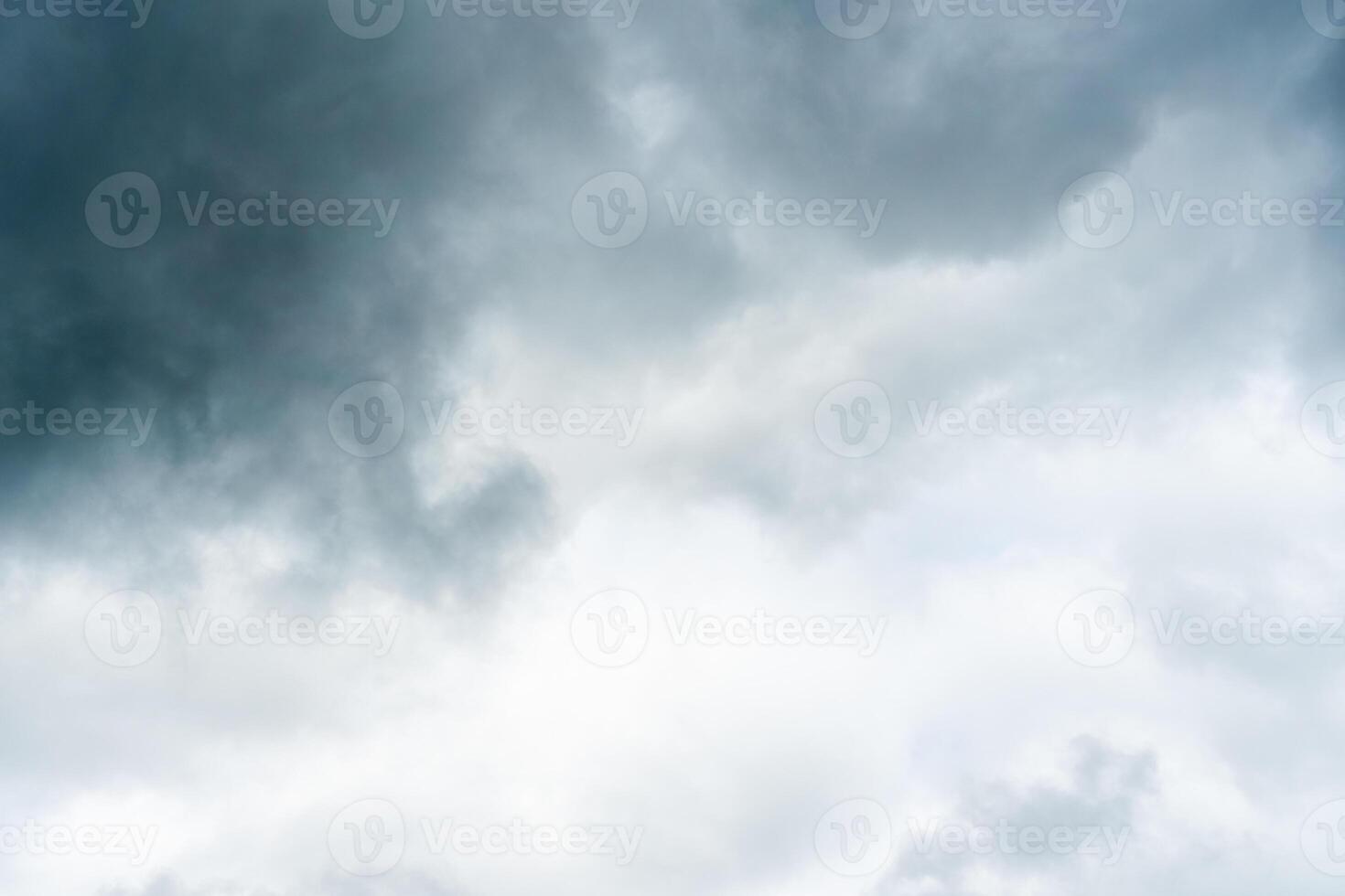 Dark dramatic storm cumulus clouds in autumn. An impending storm, hurricane or thunderstorm. Bad weather. photo