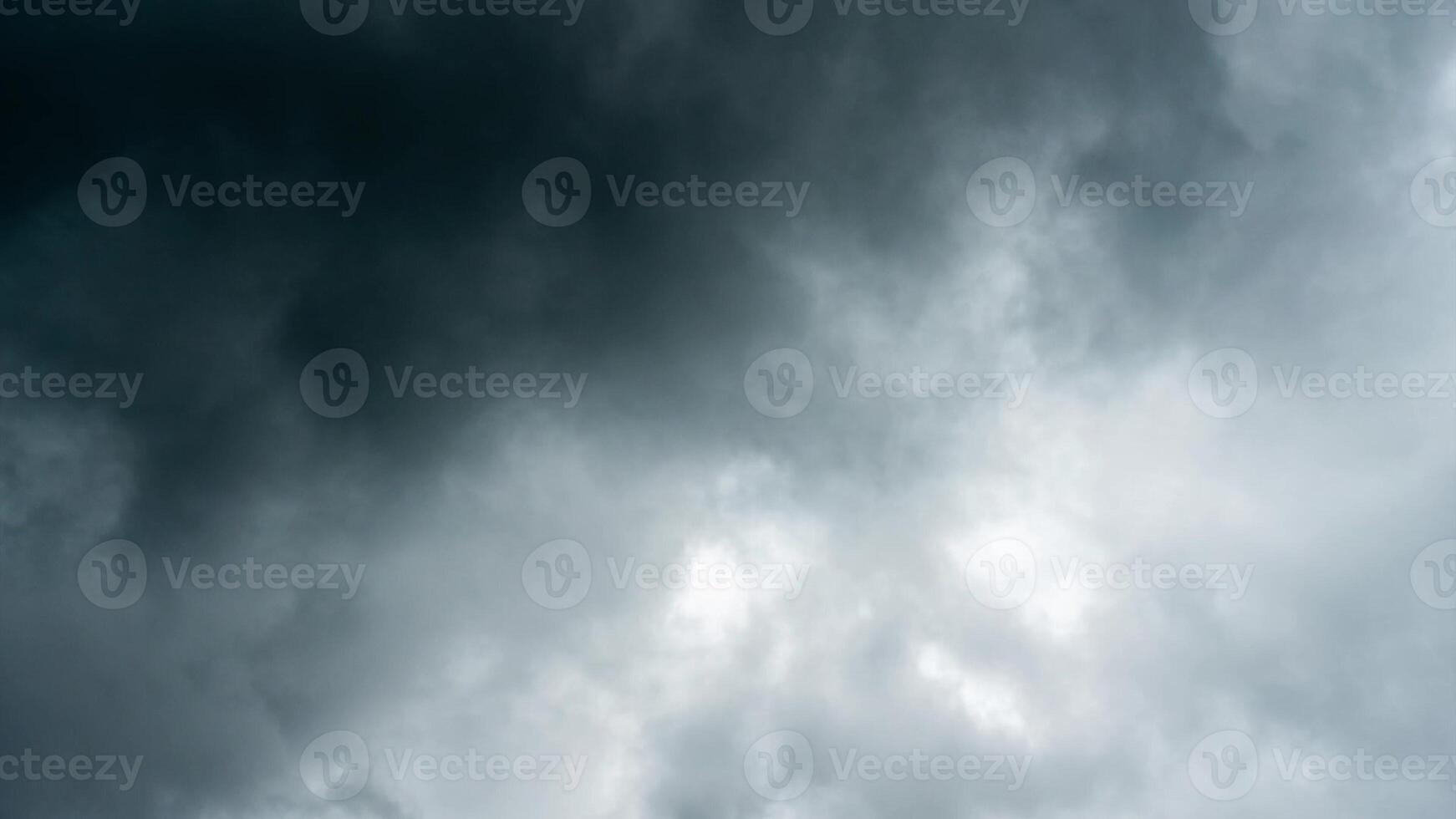 Timelapse with dark dramatic storm cumulus clouds in autumn. An impending storm, hurricane or thunderstorm. Bad weather.4k resolution. photo