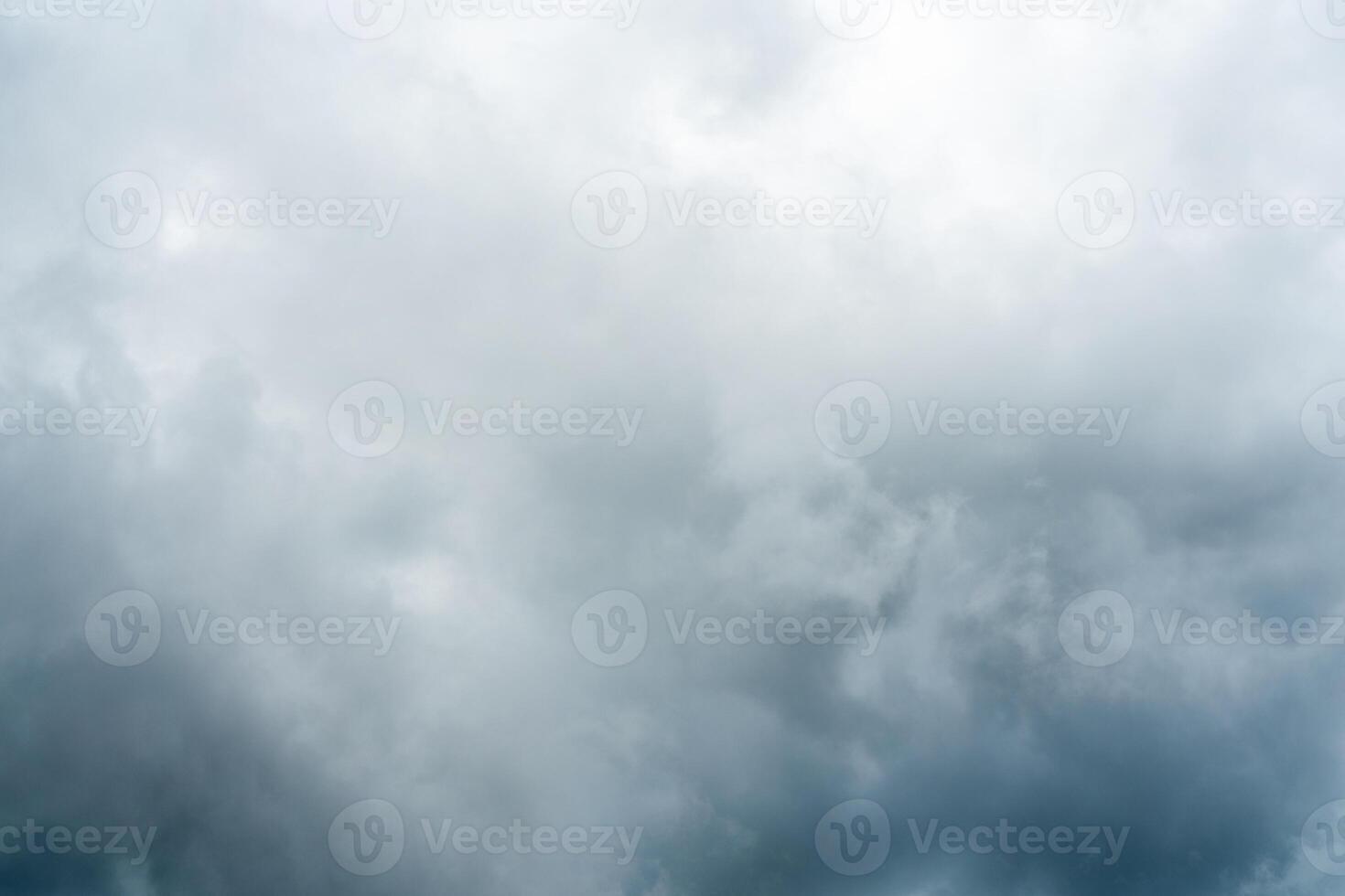 Dark dramatic storm cumulus clouds in autumn. An impending storm, hurricane or thunderstorm. Bad weather. photo