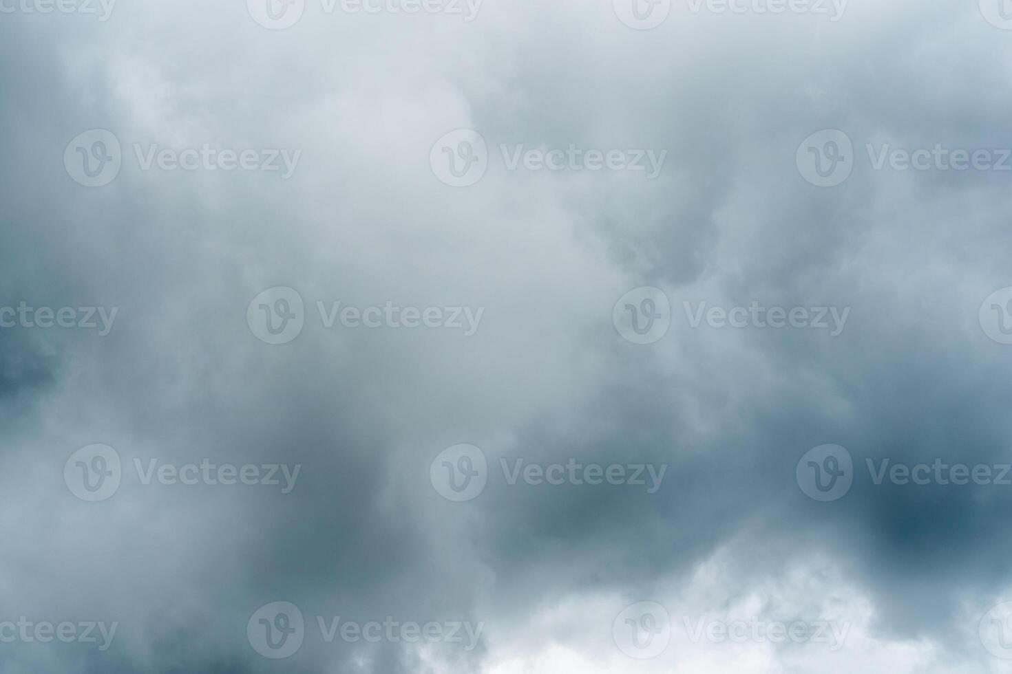 Dark dramatic storm cumulus clouds in autumn. An impending storm, hurricane or thunderstorm. Bad weather. photo