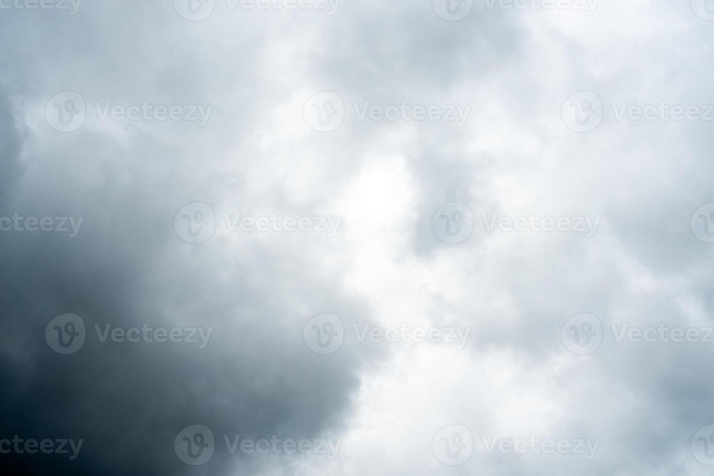 Dark dramatic storm cumulus clouds in autumn. An impending storm, hurricane or thunderstorm. Bad weather. photo