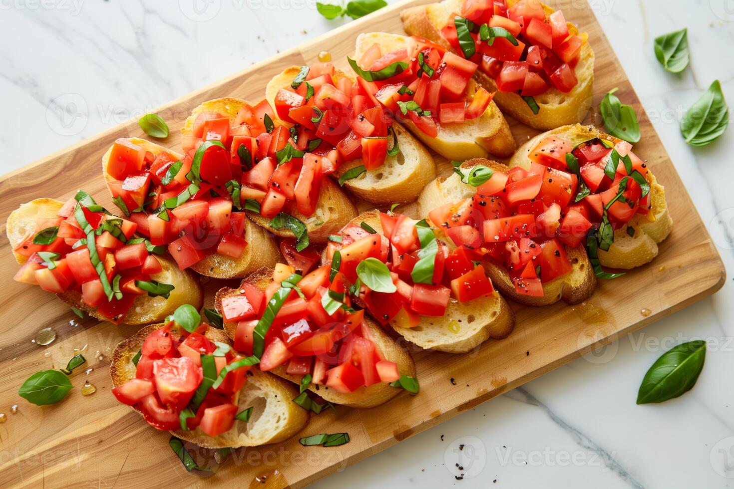 tomato bruschetta topped with fresh basil on crispy bread photo