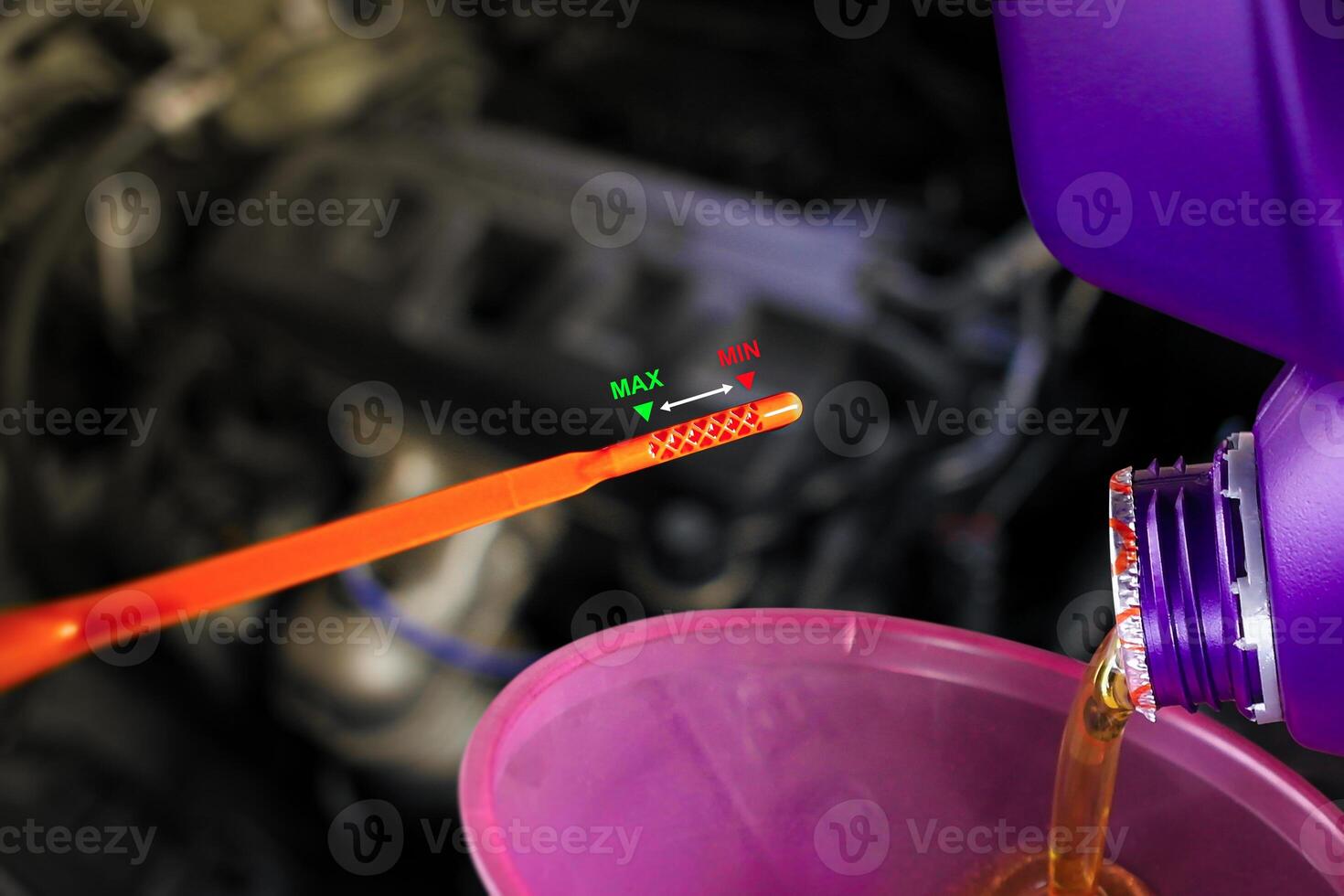 Maximum and minimum engine oil level indicators , oil dipstick with level indicator , Car maintenance concept photo